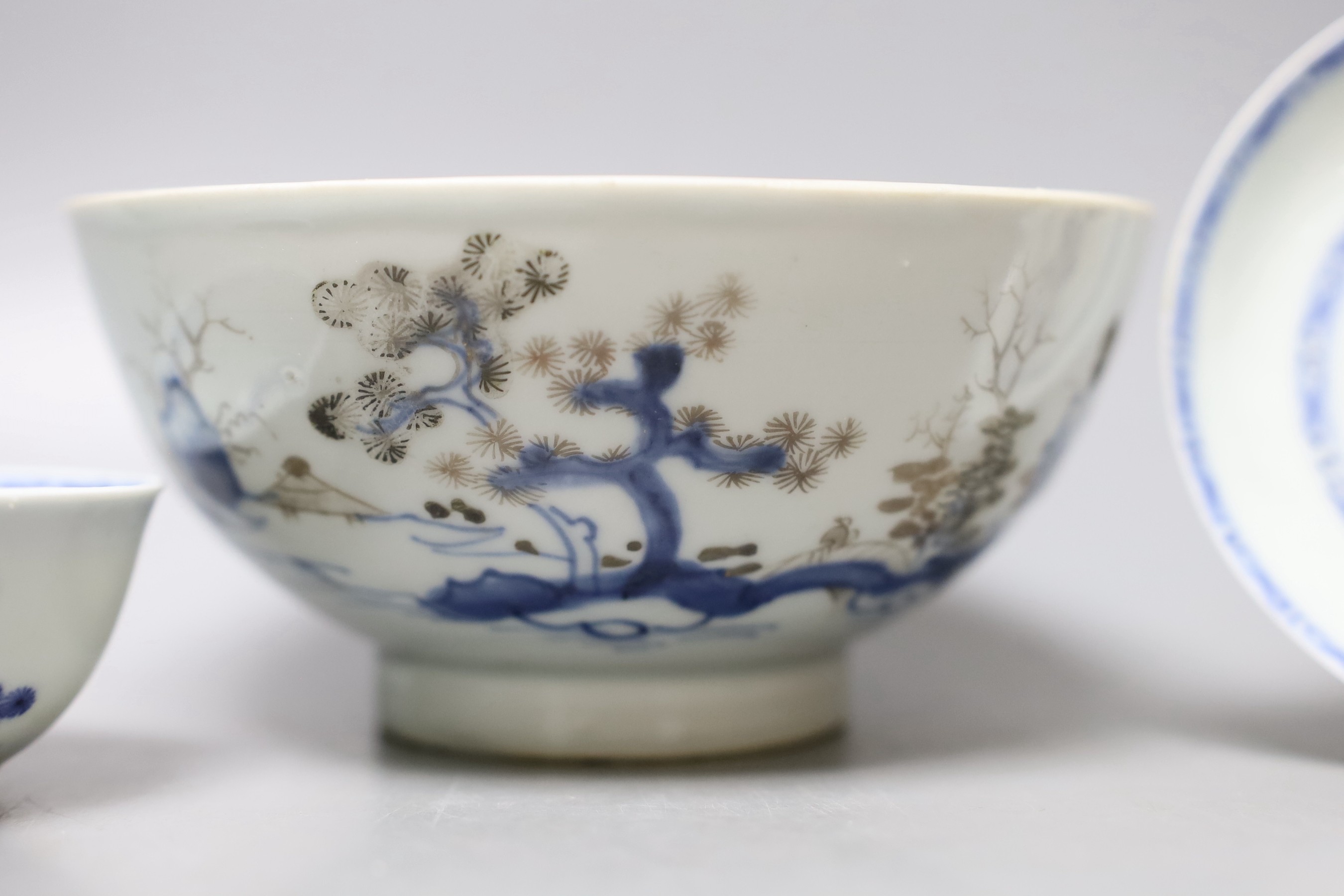 A Chinese Nanking cargo blue and white bowl and a tea bowl and saucer (Christie's label on base)